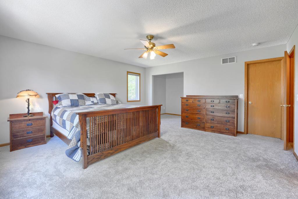 Primary with sitting area and walk-in closet