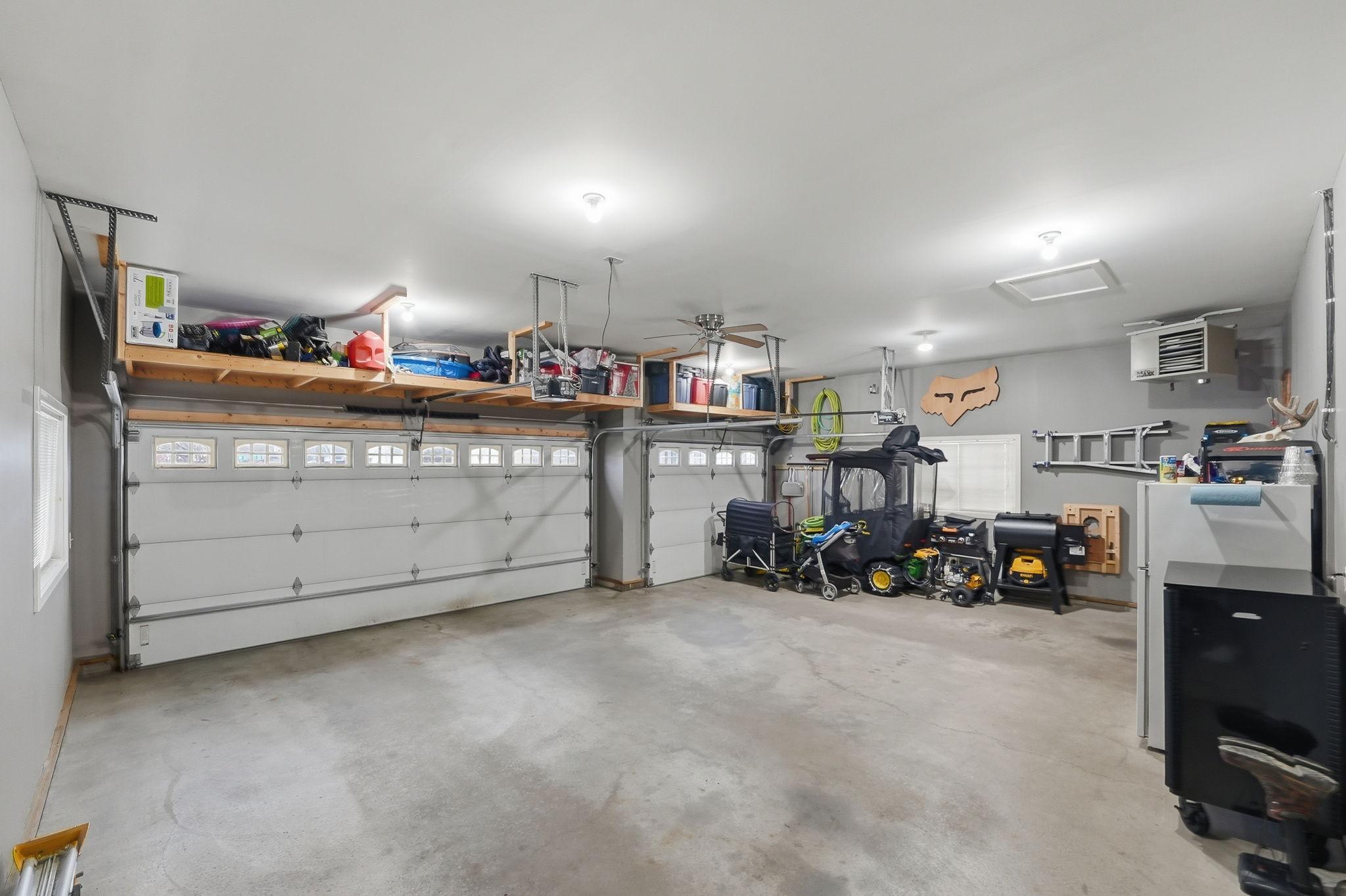 Organized 3-stall garage.