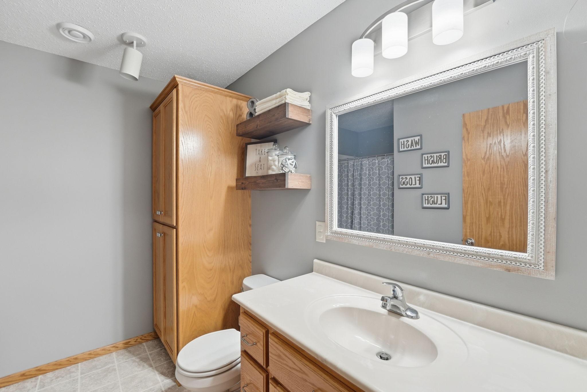 Efficiently designed bathroom maximizing space.