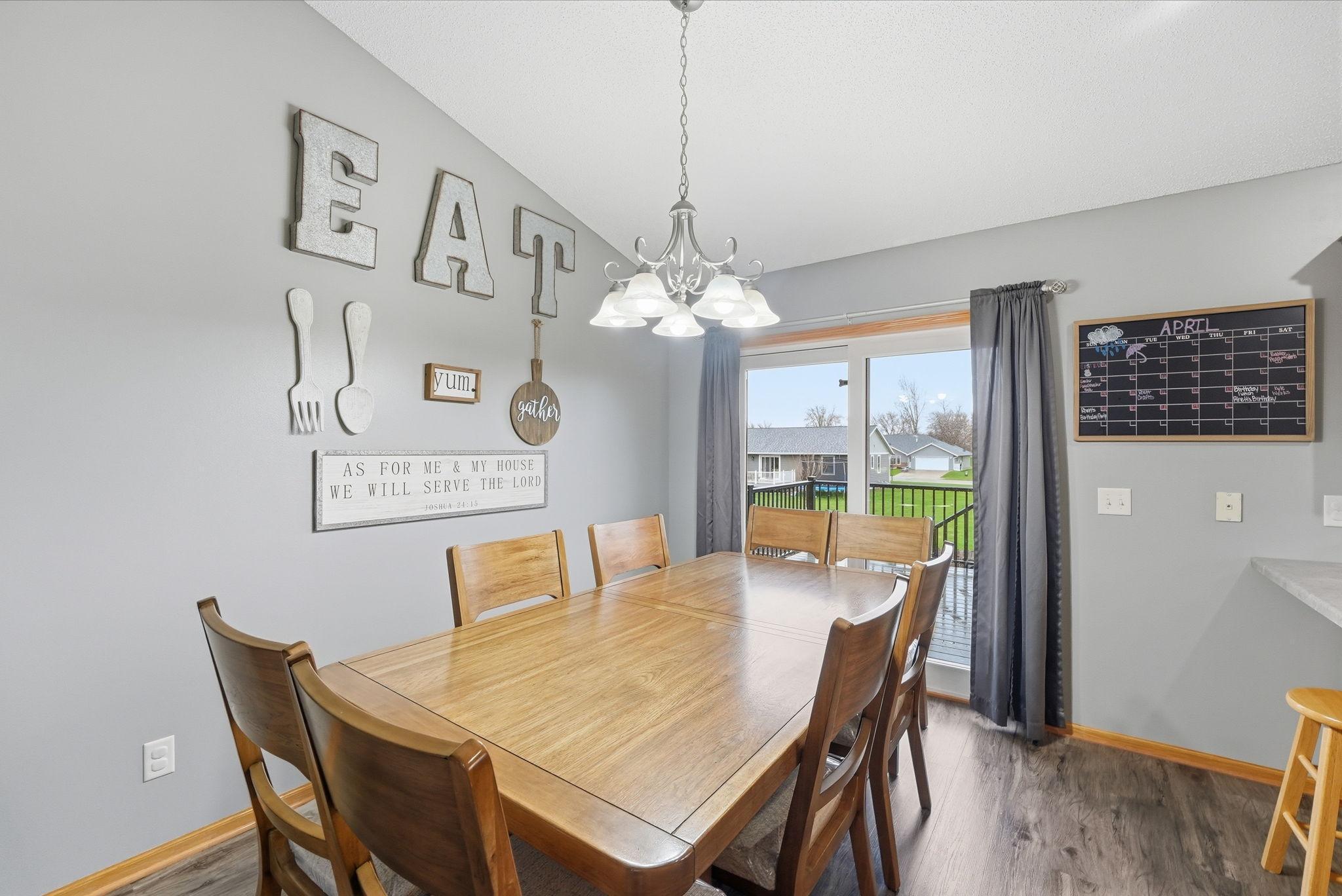 The dining room lends access to the backyard deck.