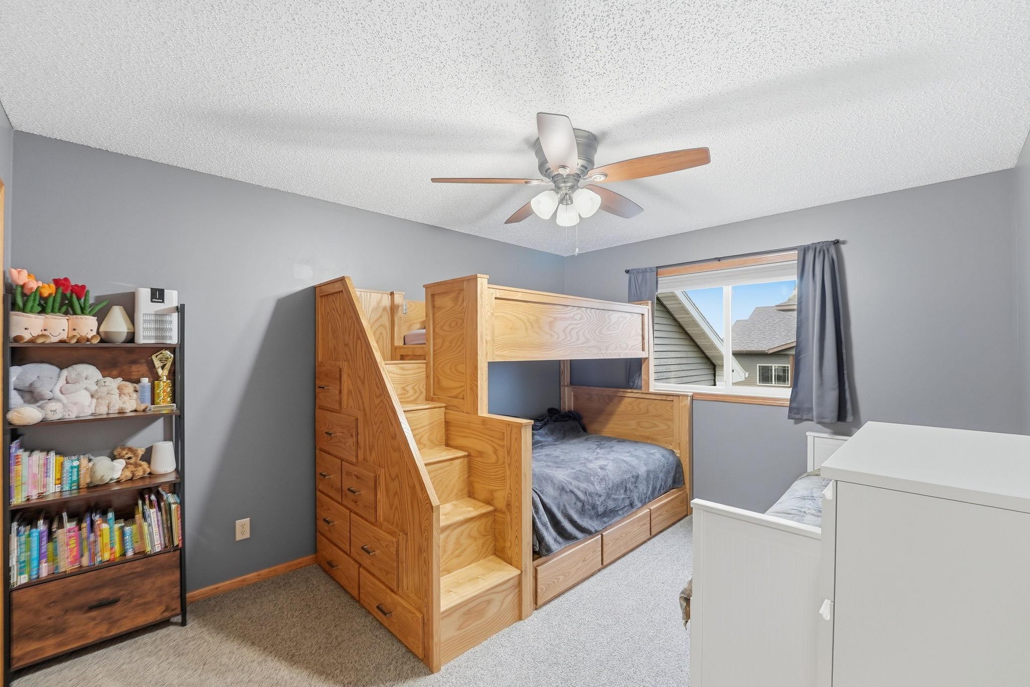 Another well-maintained upper-level bedroom.