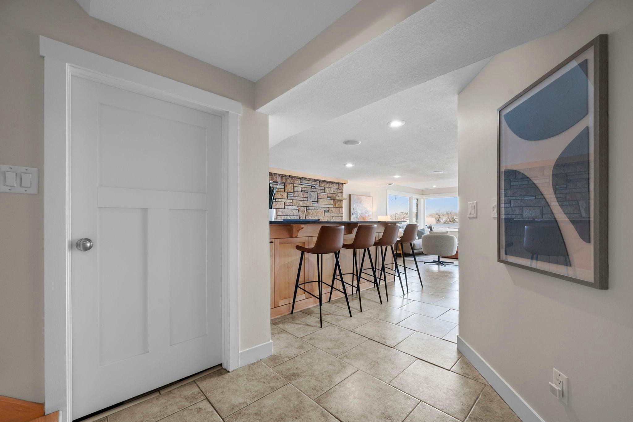 View into rec room from bottom of stairs.