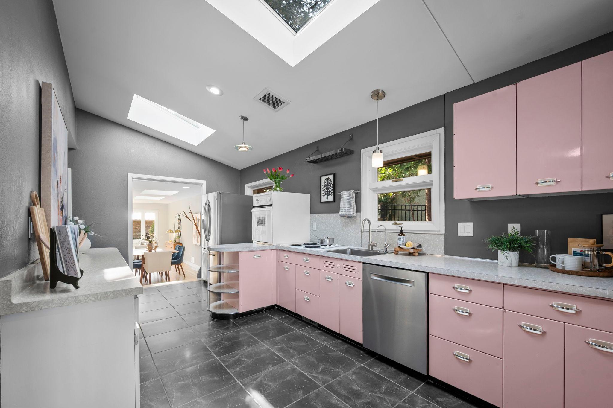 Stainless steel dishwasher and refrigerator.