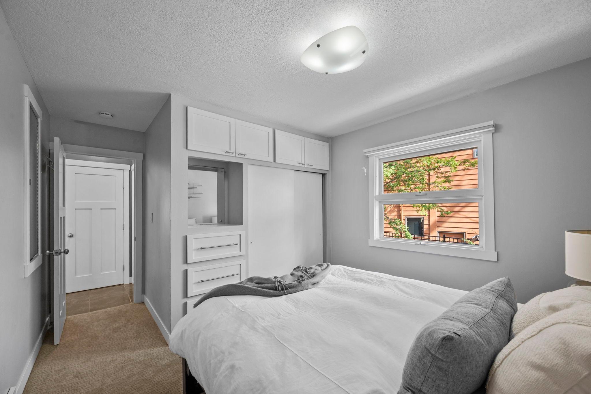 with built in drawers and closet space.