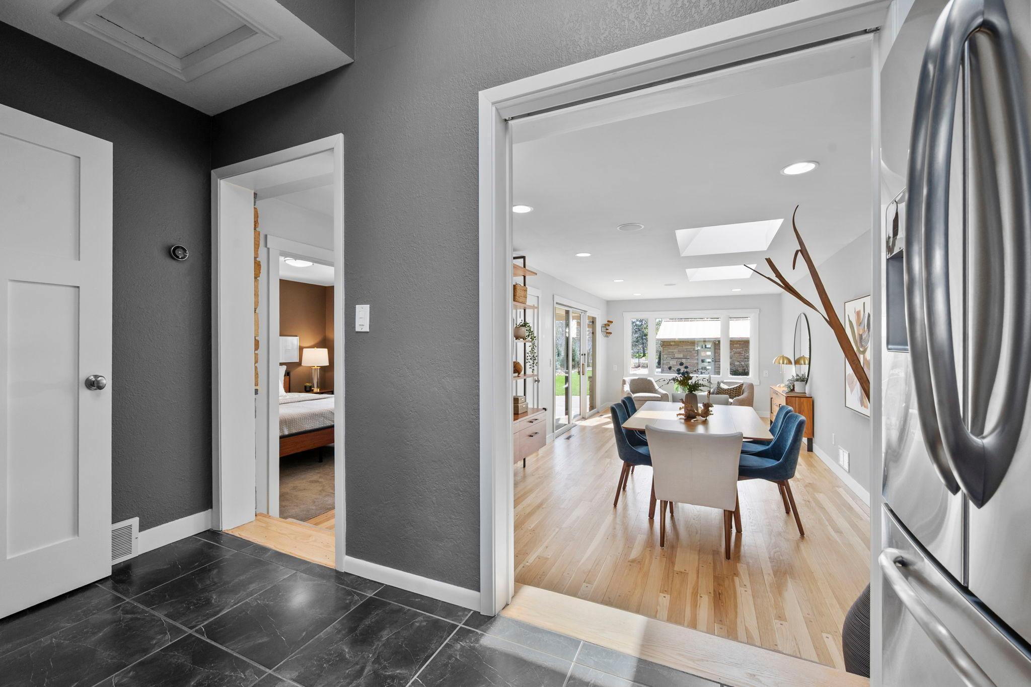 Home is rich in character with step down to dining and sitting room.