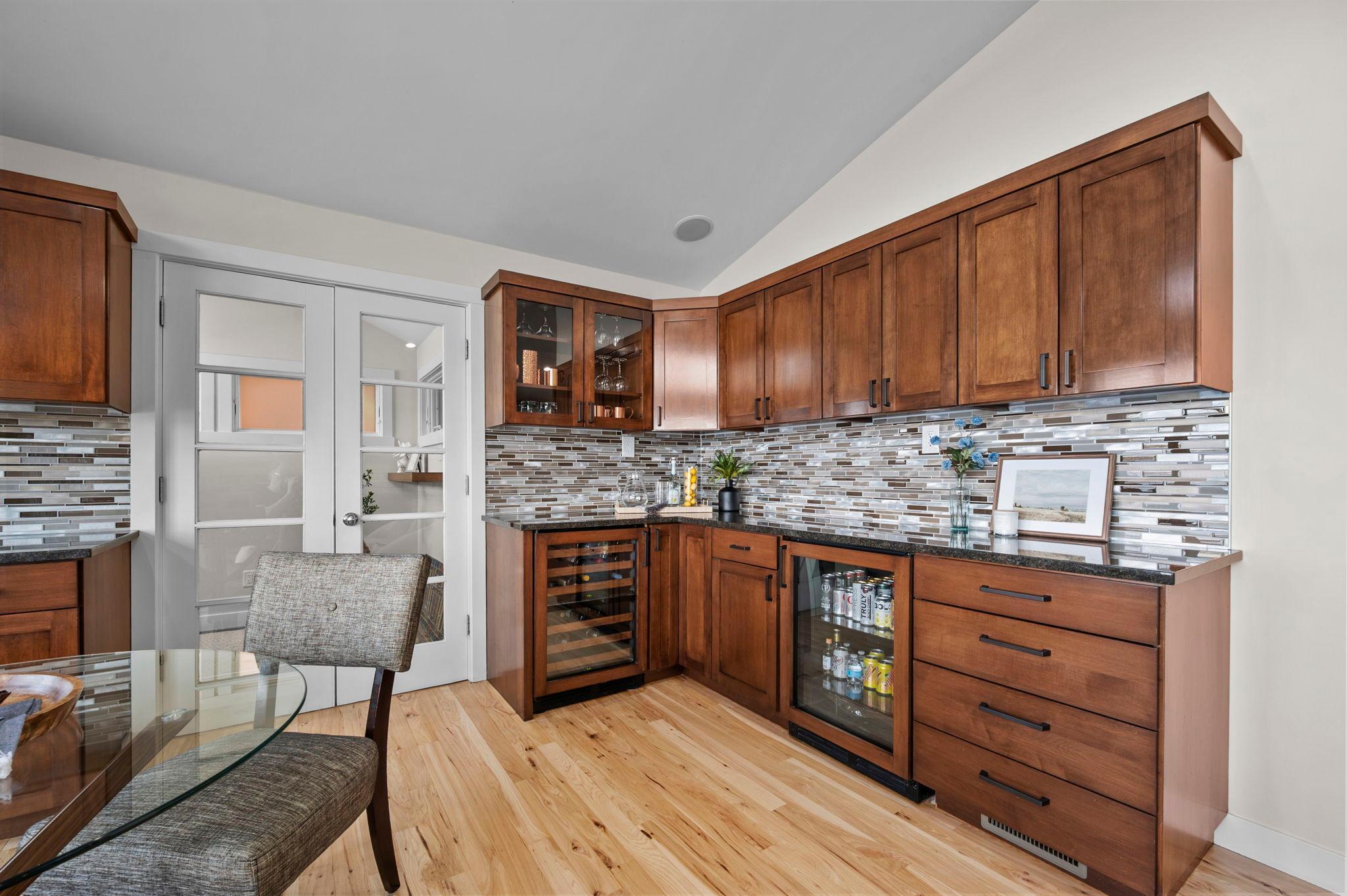 Gorgeous cabinetry with Beveridge and wine fridge