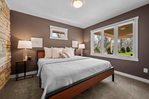 One of 2 generous sized main floor bedrooms.
