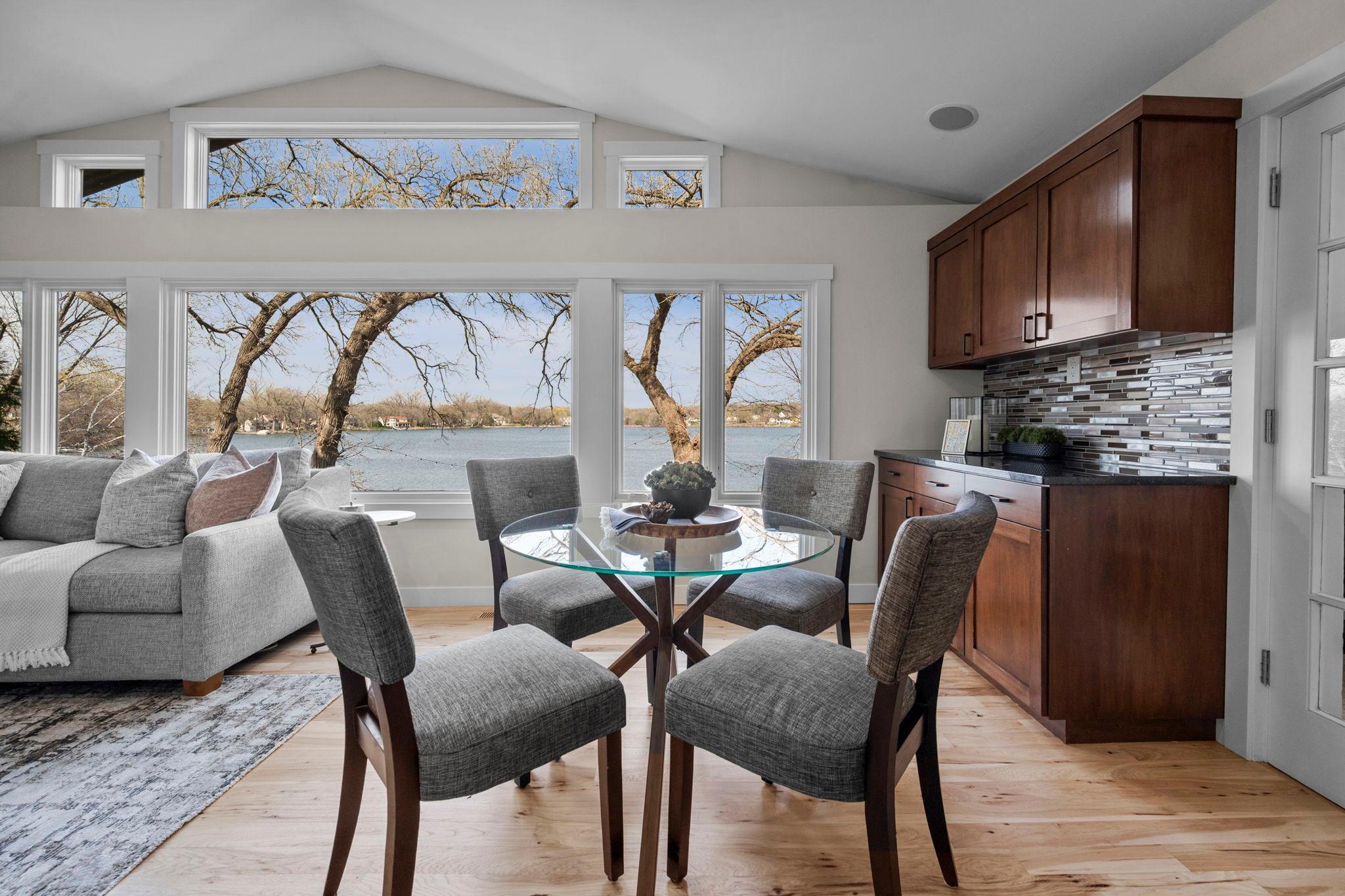 Custom cabinets with granite countertops and tile backsplash.