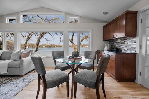 Custom cabinets with granite countertops and tile backsplash.