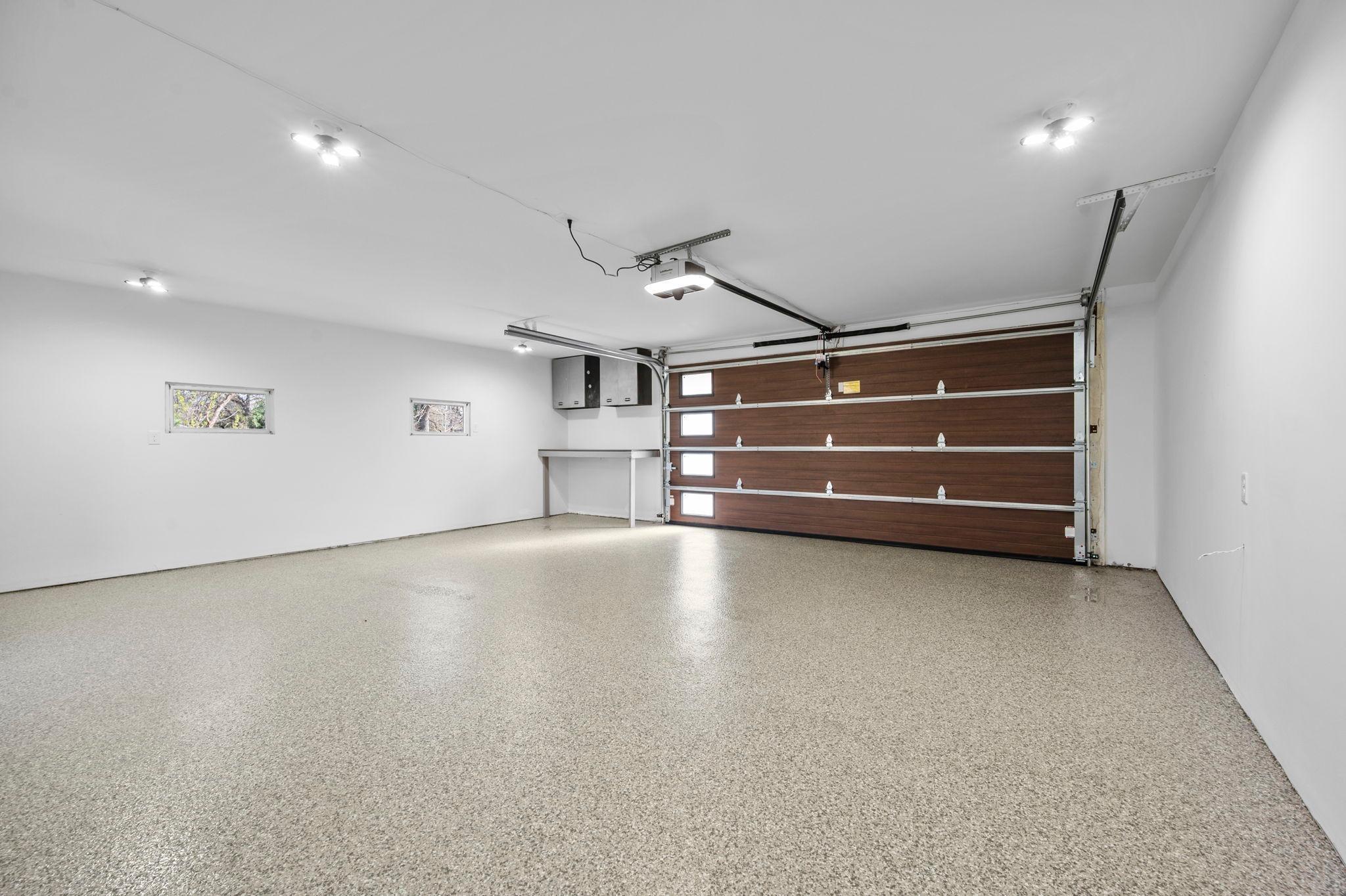 New overhead garage door, opener & service door