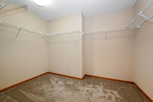 Generous walk-in closet off primary suite.