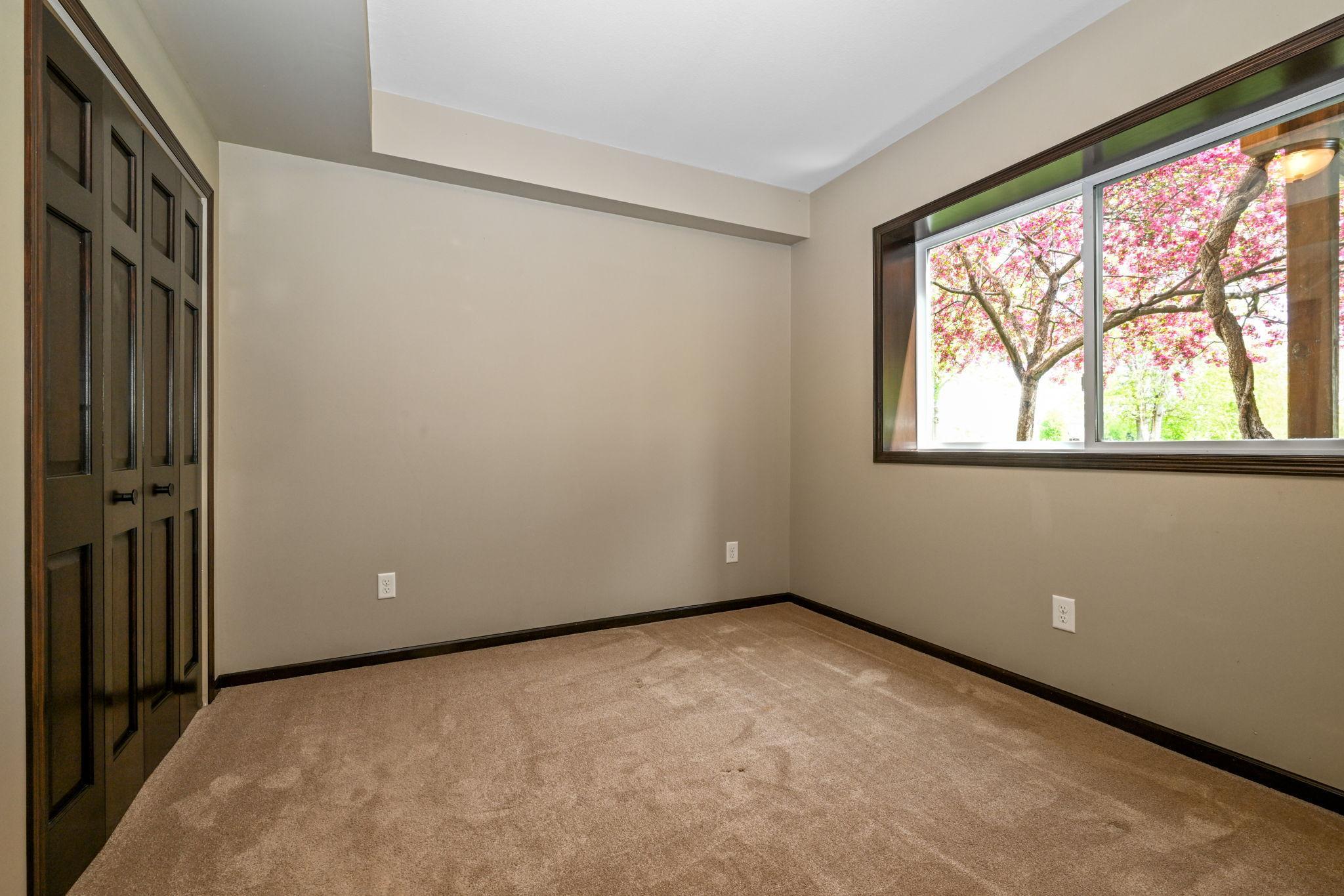 Bedroom #5 is just off the theater room and is also pond facing.