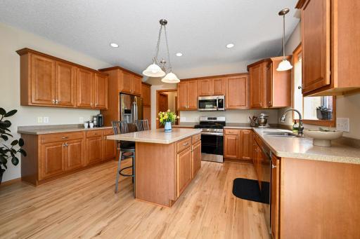 Beautiful custom cabinets & walk-in pantry are why you'll love this kitchen!