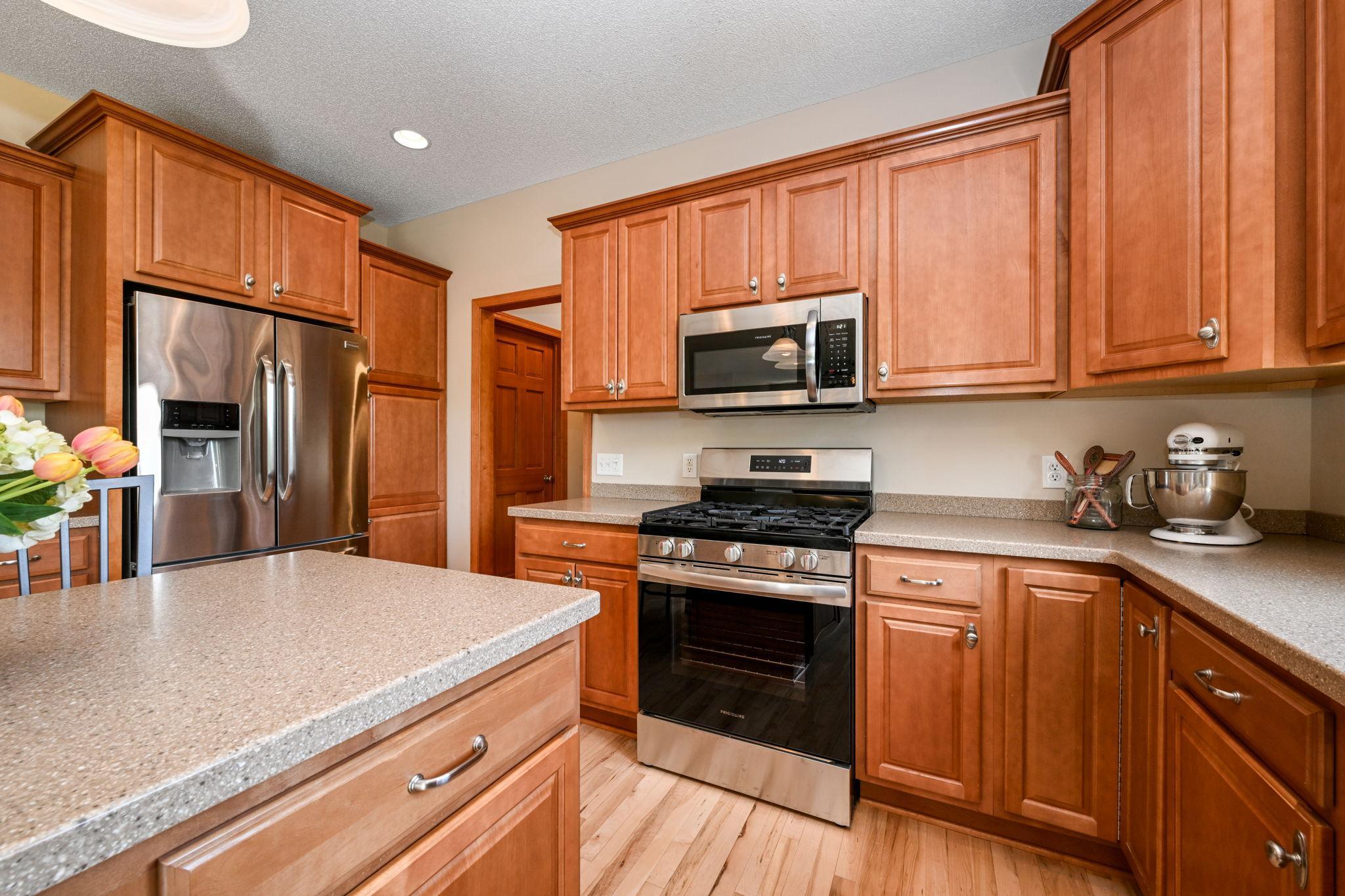 Hallway leads to huge walk-in pantry.
