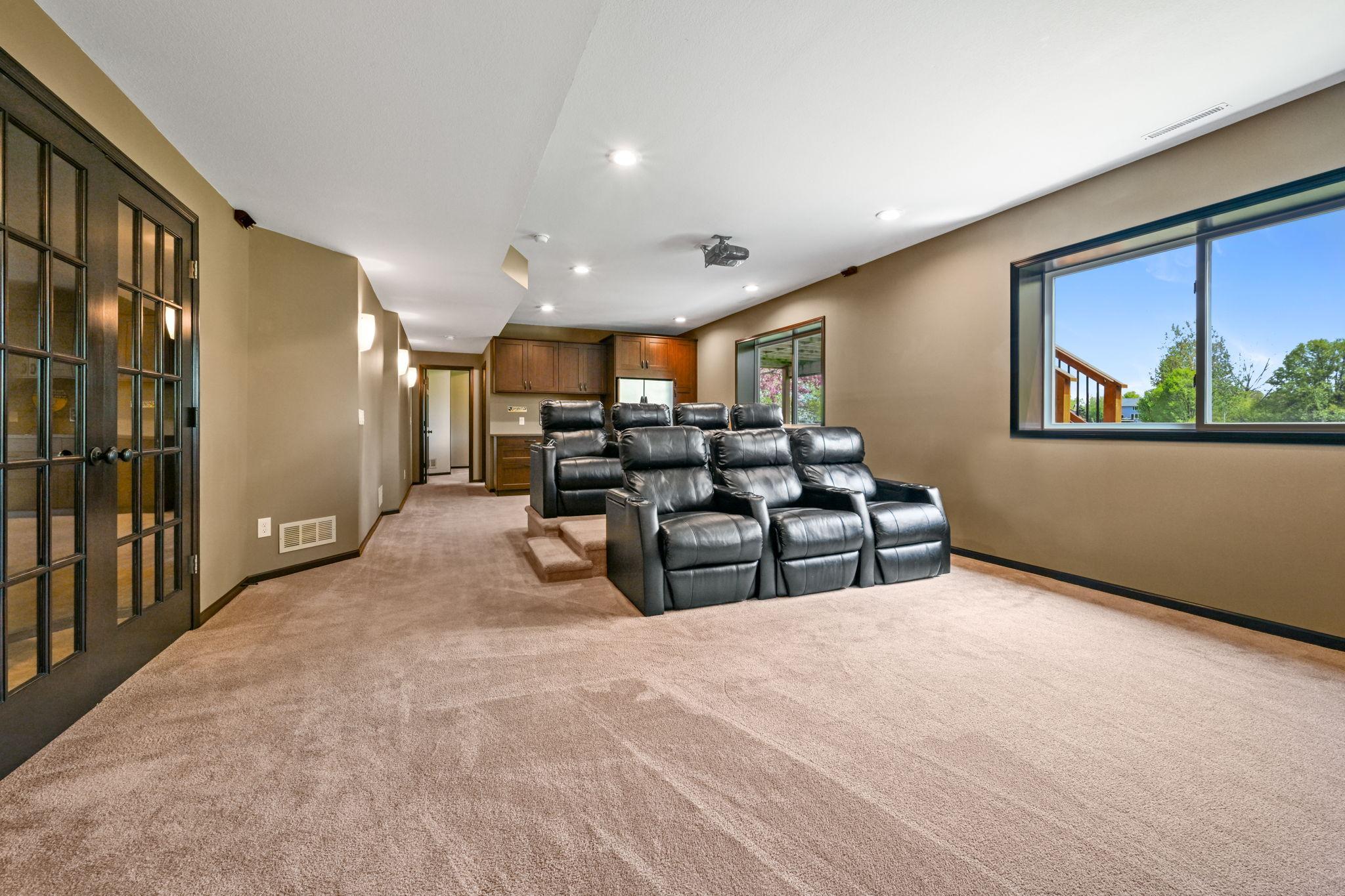 Lower level theater room & wet bar, so fun!