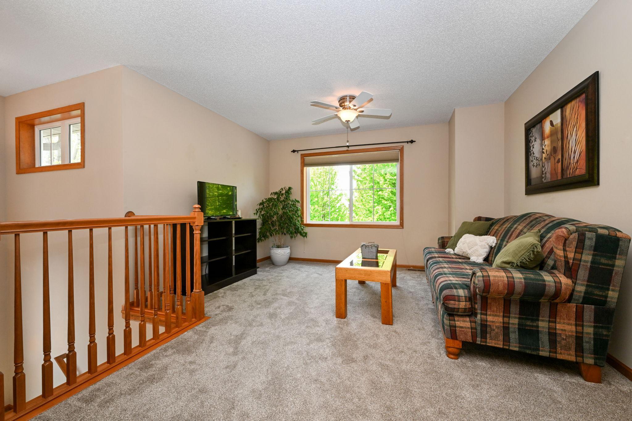 Upper level loft greets you off the stairway.
