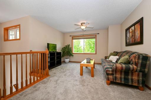Upper level loft greets you off the stairway.
