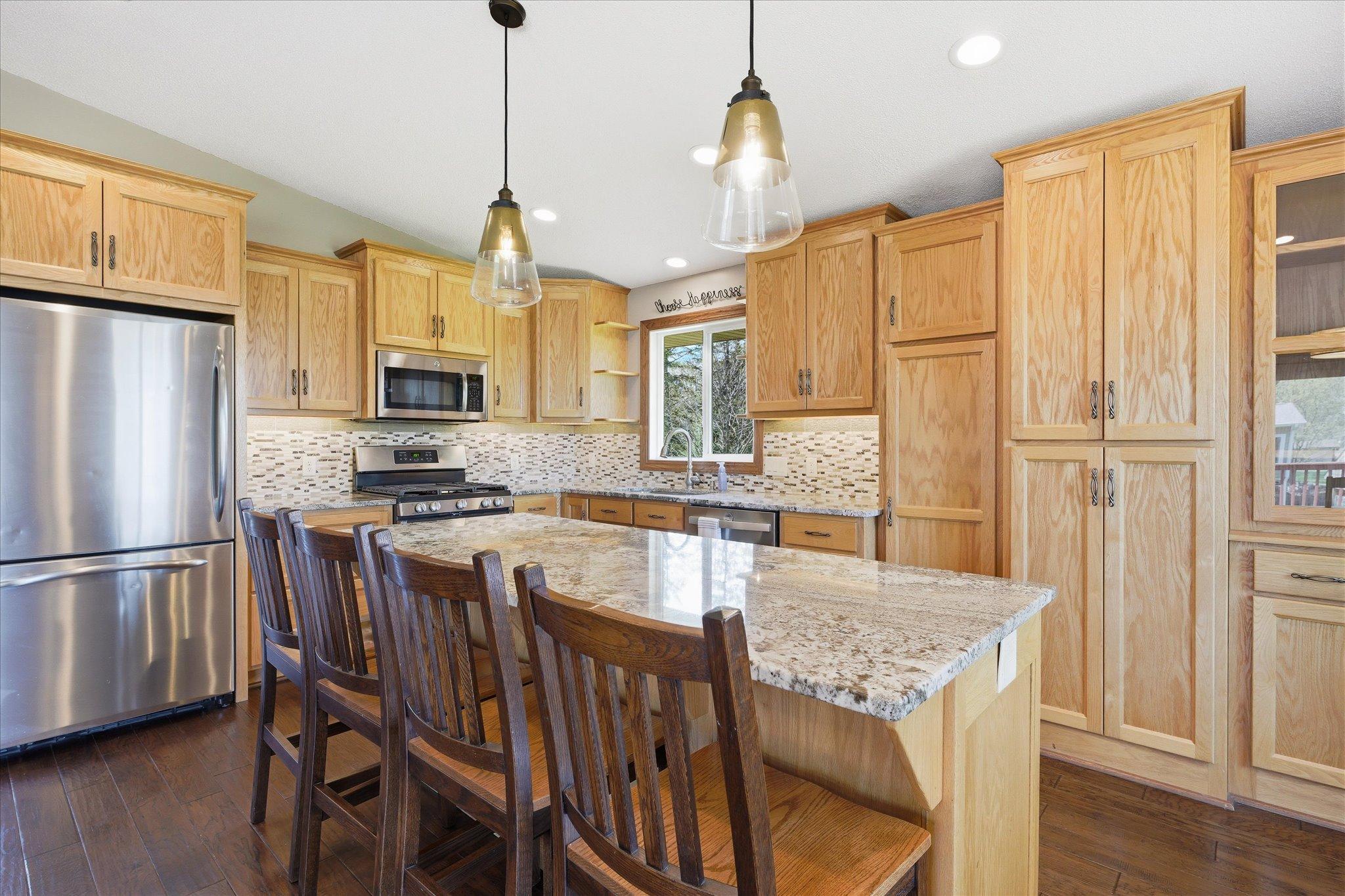 Just picture yourself sitting at this gorgeous center island or cooking your favorite meal in this kitchen!