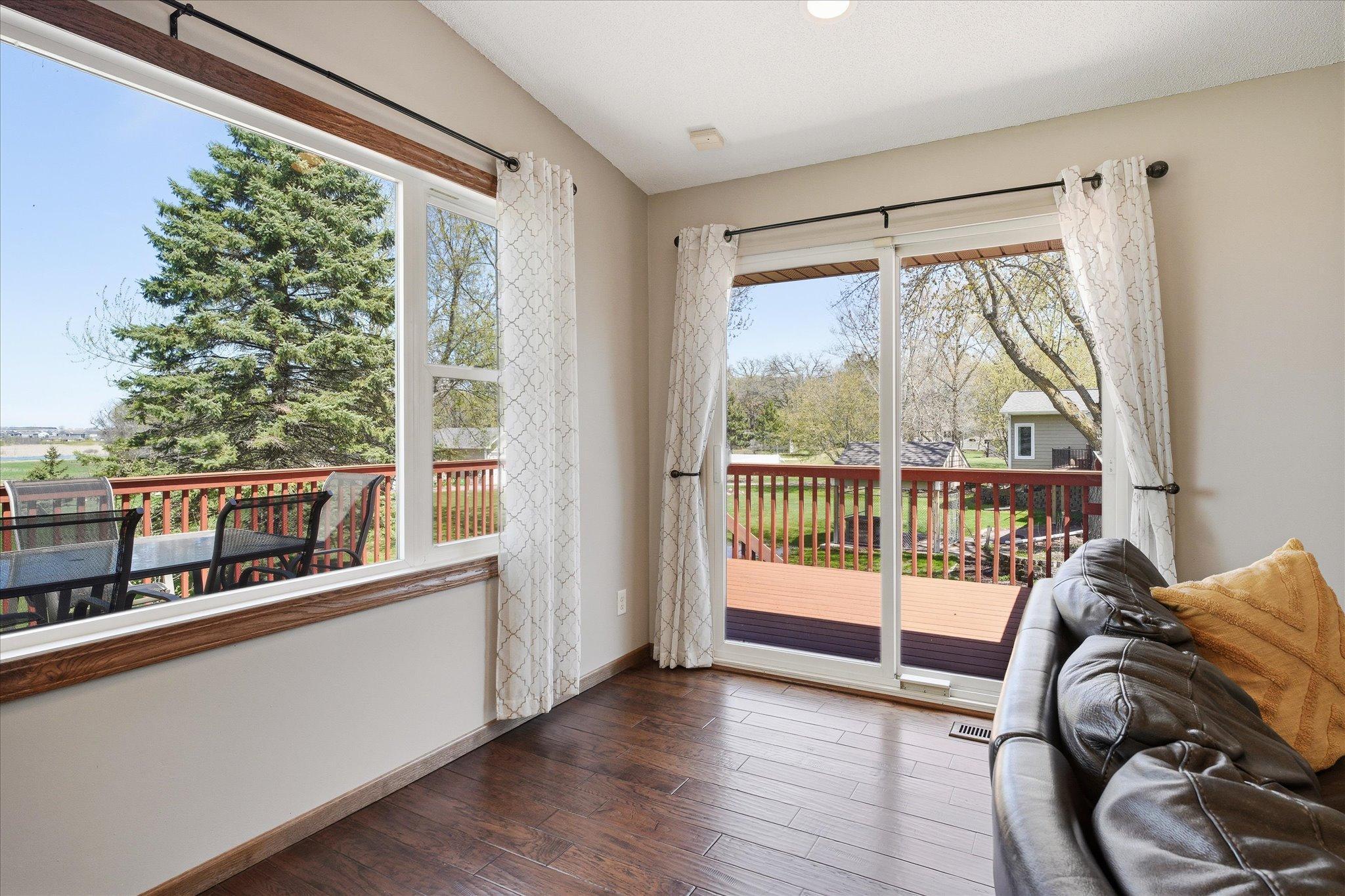 The patio door in the living room area opens out to the huge wrap around deck with maintenance free decking.