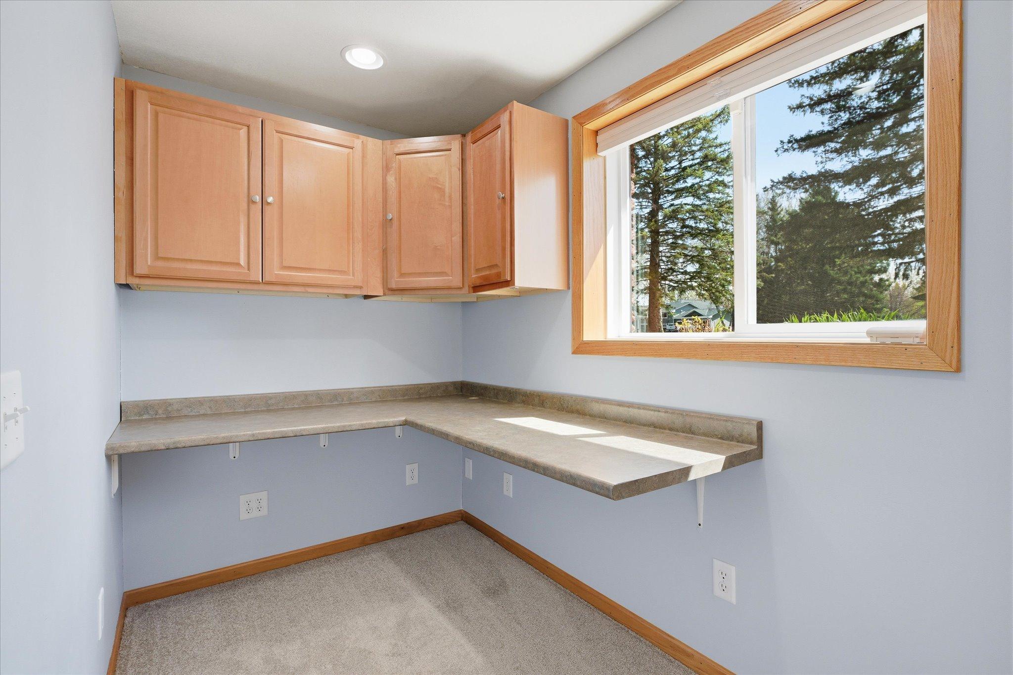 The office nook area in the lower bedroom is perfect for work at home needs or crafts or just extra storage needs.