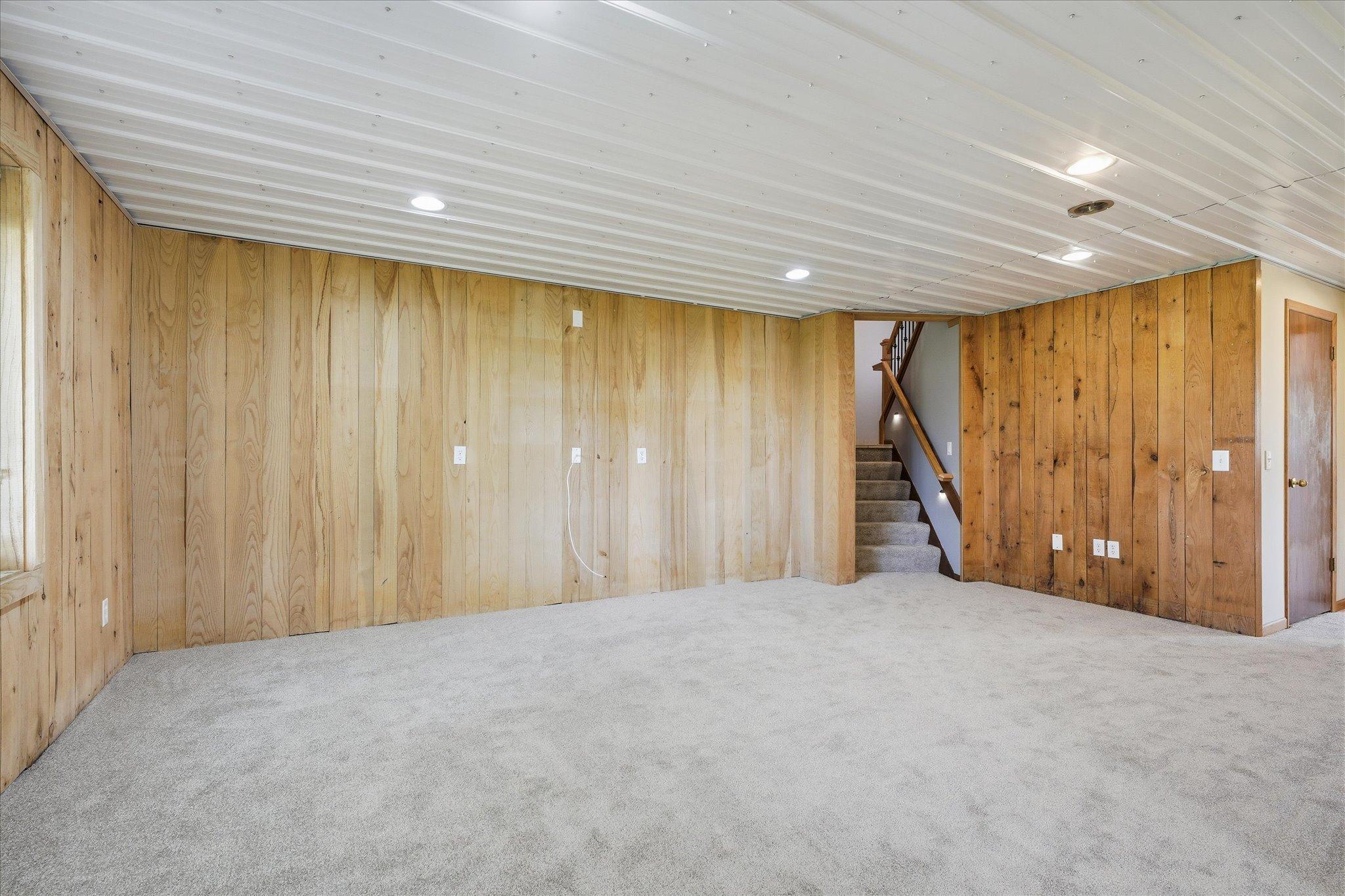 Moving down to the lower walkout level of the home is this huge family room area. The entire lower level has brand new carpeting.