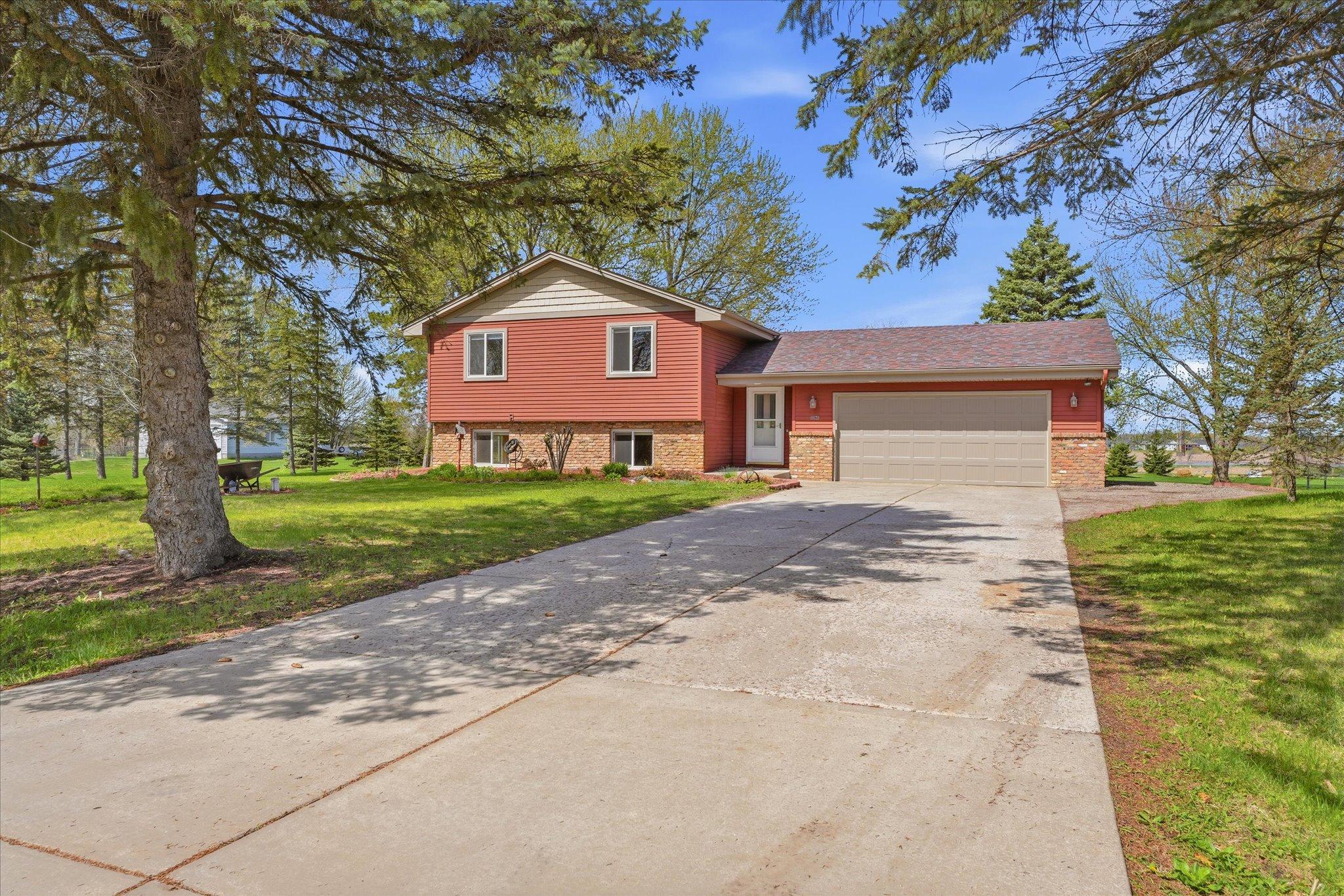 Home is slightly set back off of the road with plenty of parking space.
