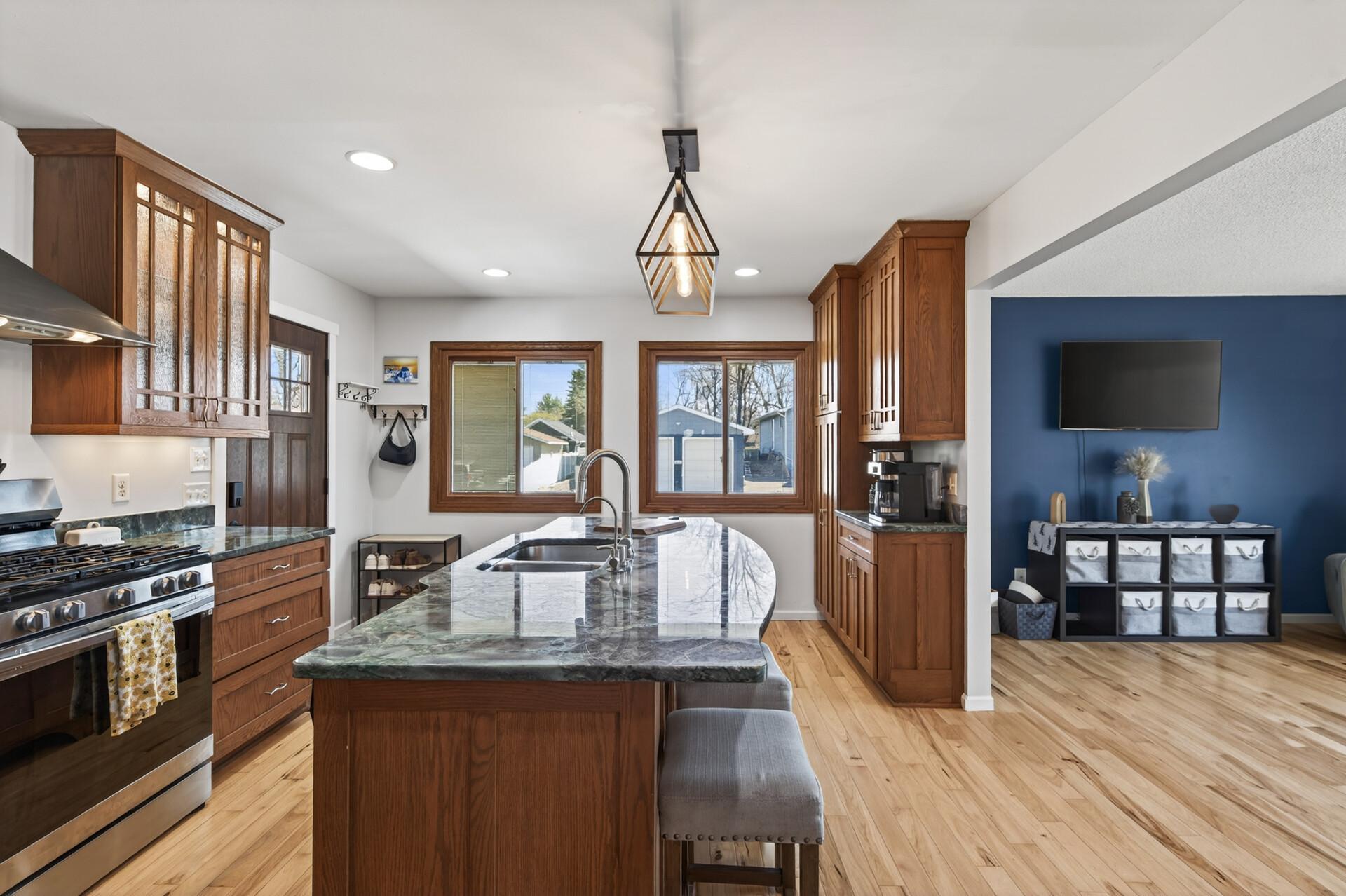 Transition into the showstopping kitchen, the true heart of the home.