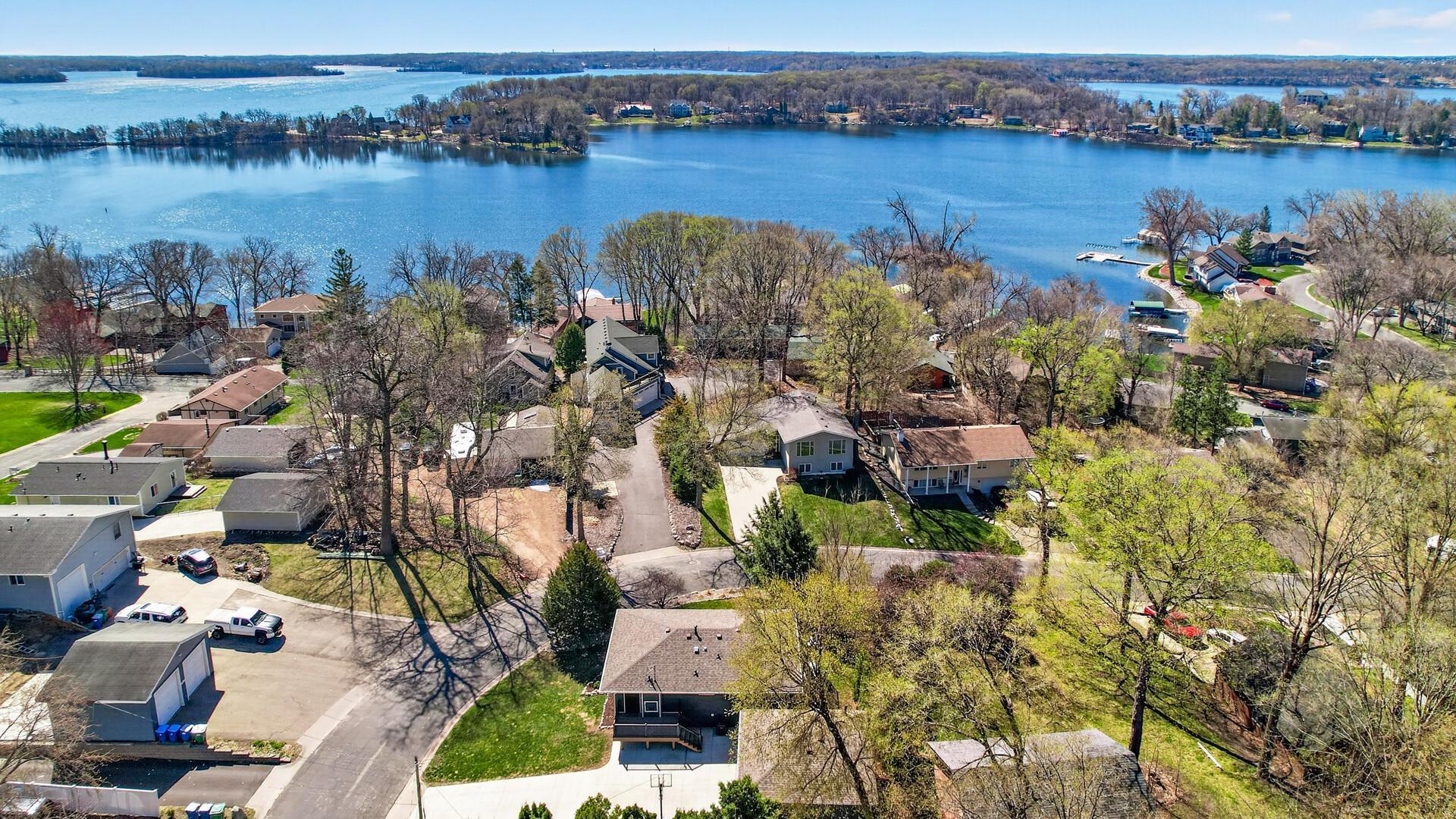 Situated on a corner lot, just minutes from parks, restaurants, shopping, and within walking distance to several lakes!