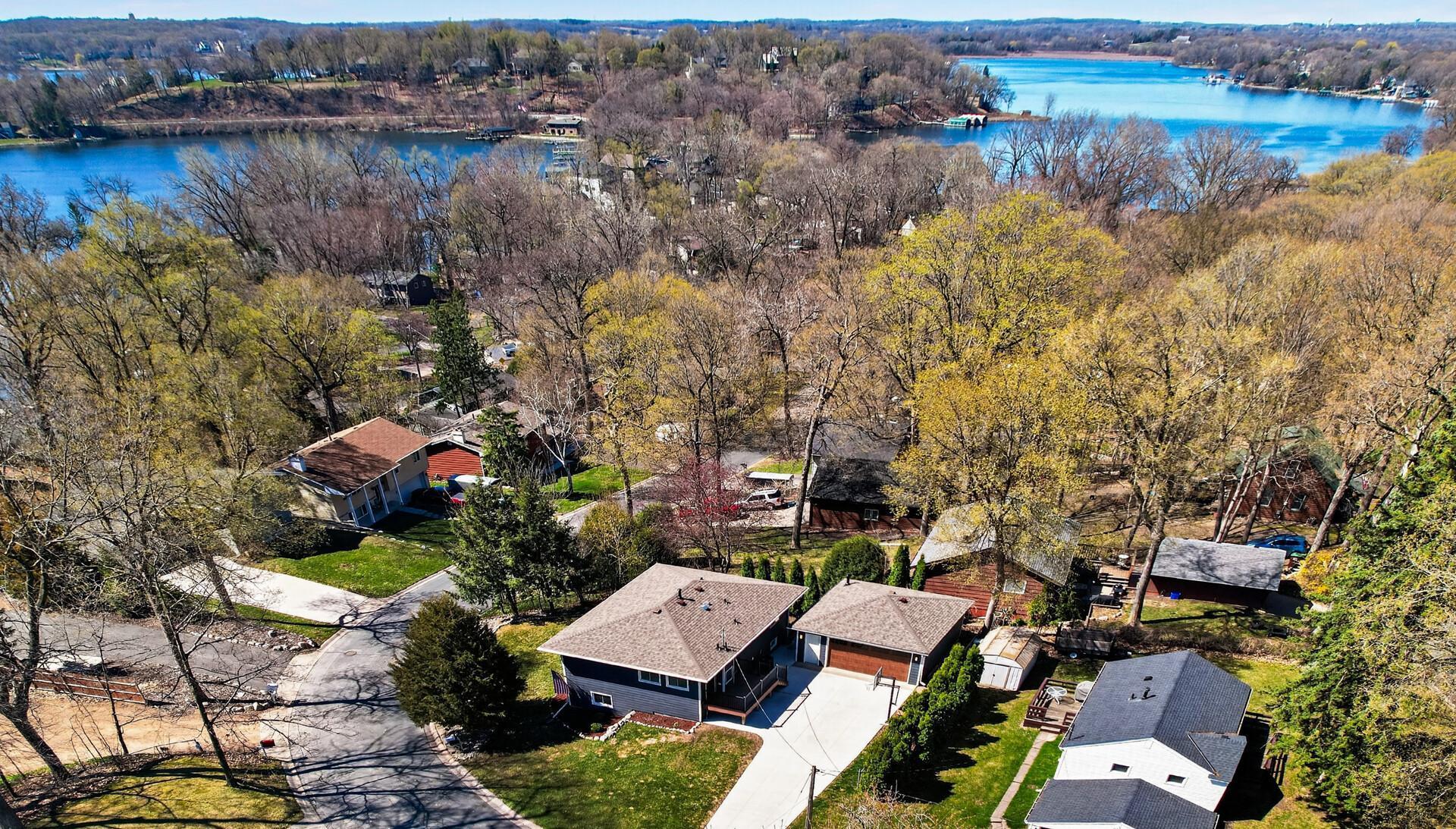 Situated on a corner lot, just minutes from parks, restaurants, shopping, and within walking distance to several lakes!