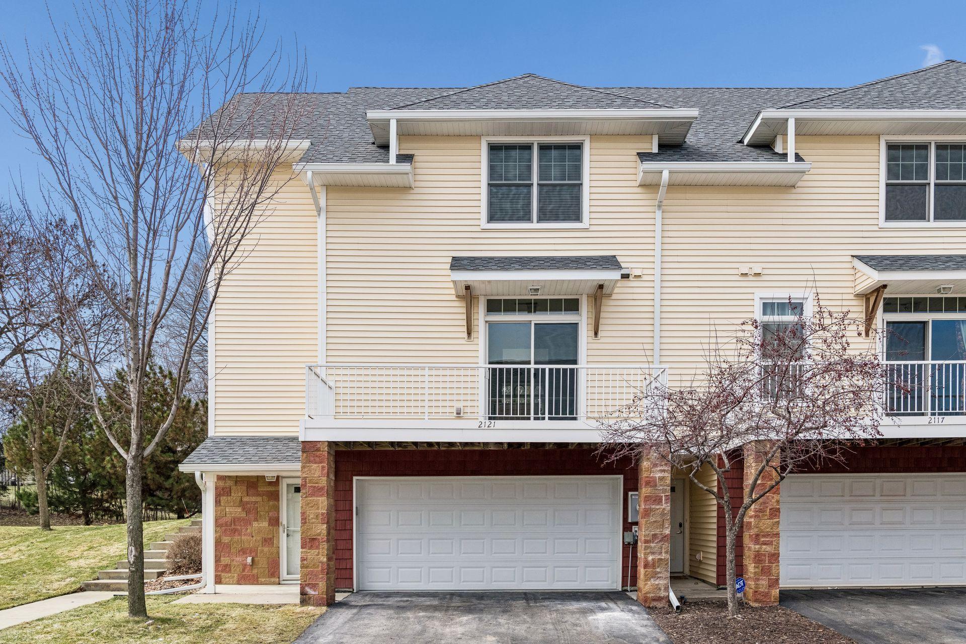 The spacious two-car garage has been upgraded with a pristine epoxy-coated floor.