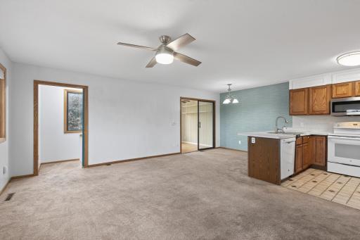 Living room access to a four season porch