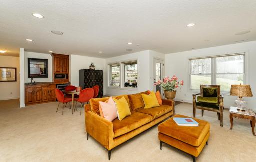 Walk-out lower level offers inviting gathering space.jpg