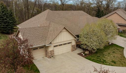 Flowering trees flank the entry of 575 Fox Chase Road.jpg