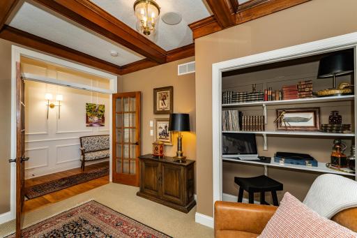 Updated lighting shines upon a thoughtfully integrated office nook designed for flexible, everyday use.jpg