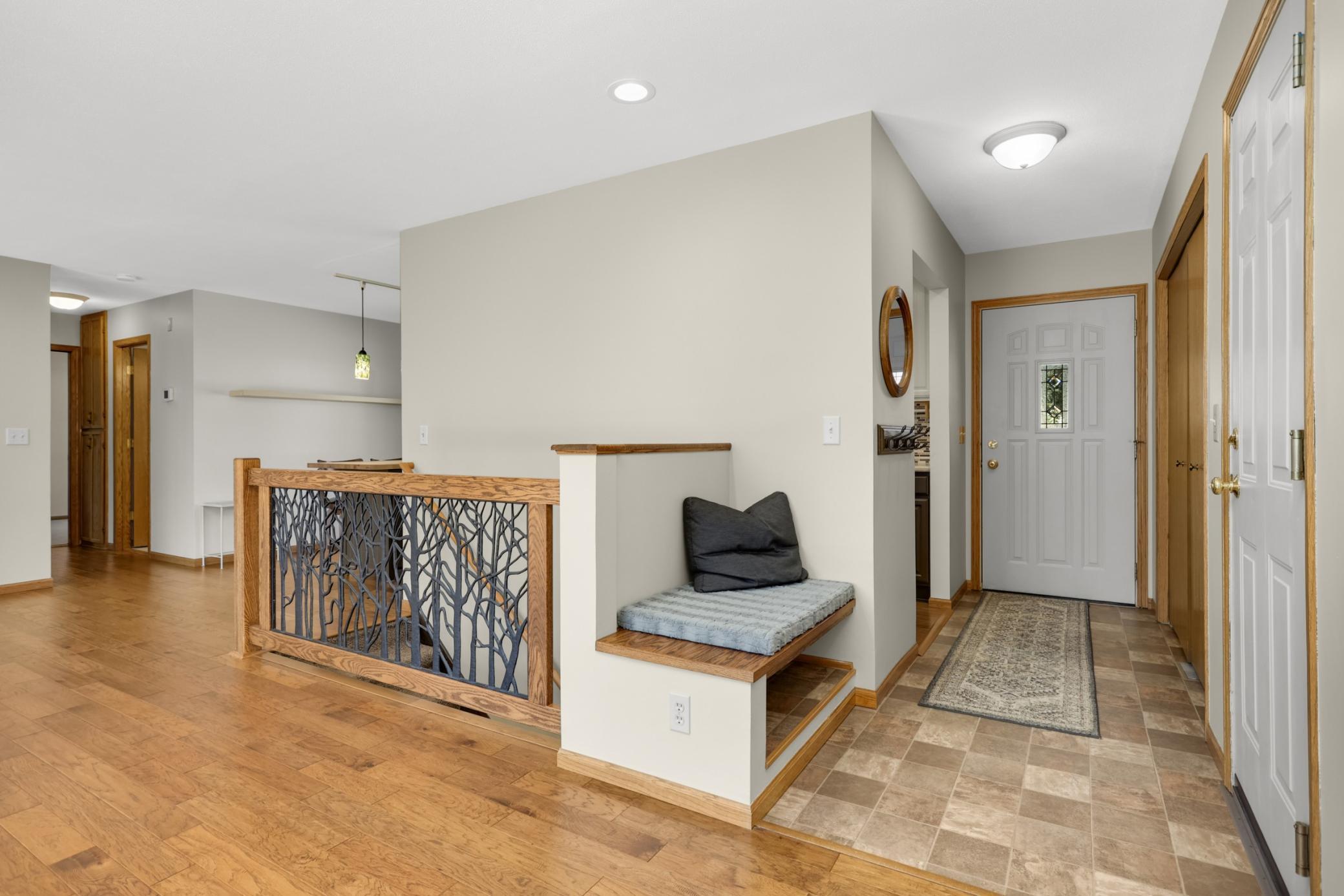 Lots of extras...including a nook for shoes as you enter. Extra shelfing in front closet for a pantry area.