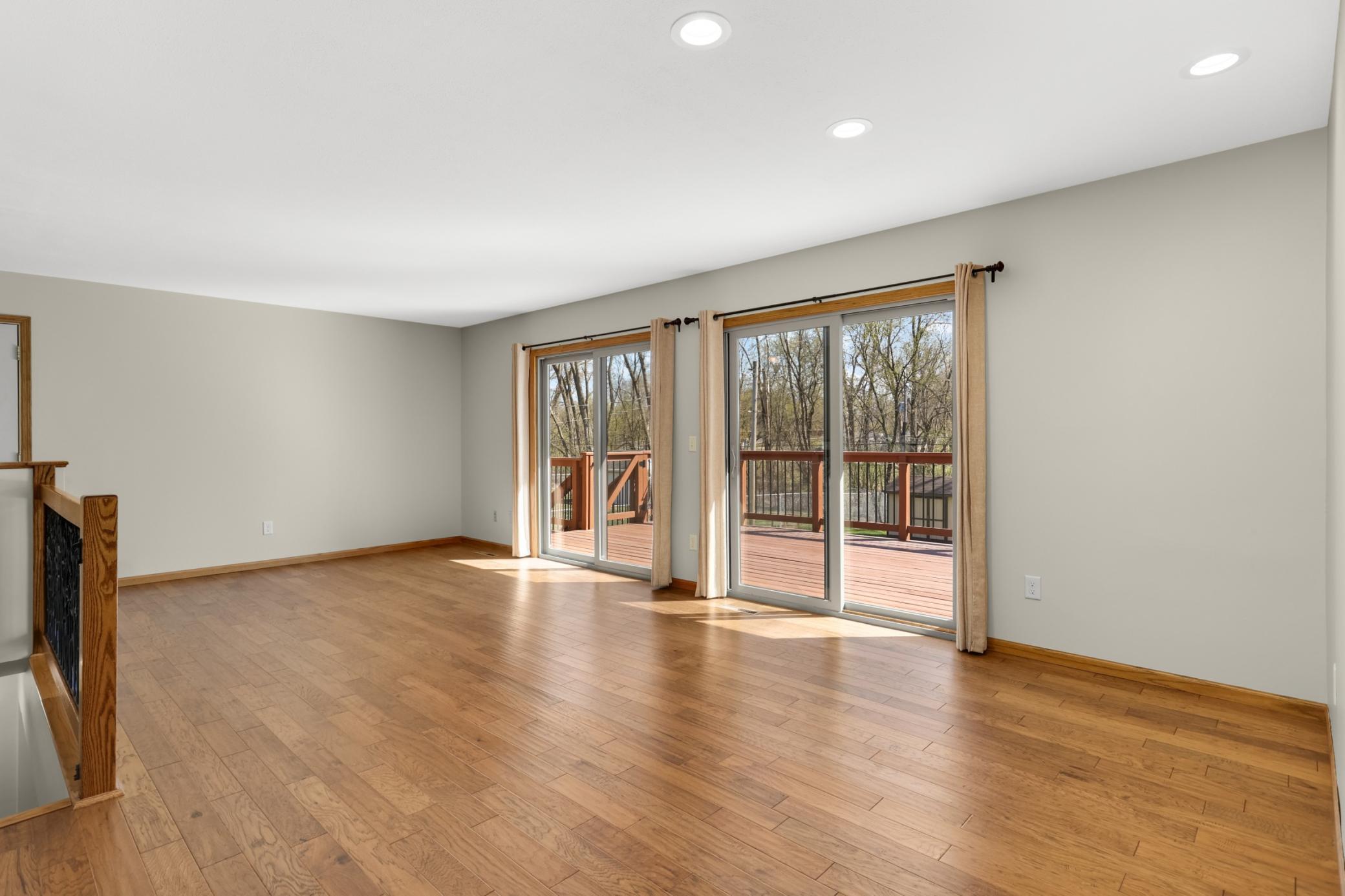 LIVING ROOM ...Backyard backs to creek and city park! Anderson patio doors.