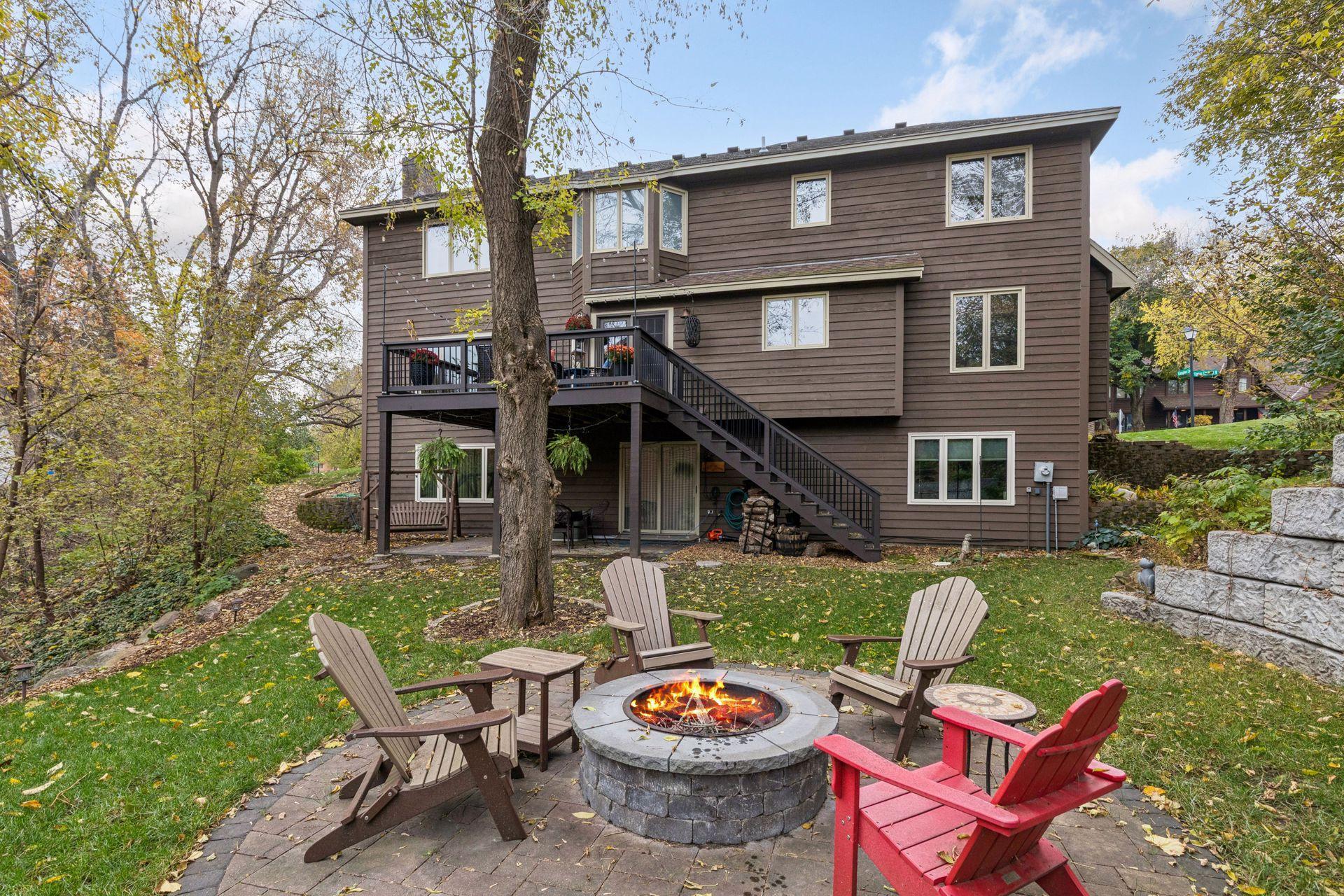 Lovely private backyard with lots of entertaining spaces including this great built in firepit area. The home also has invisible fencing for your dogs.