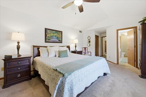This bedroom accommodates plenty of furniture, has a walk in closet and large primary en-suite bathroom.