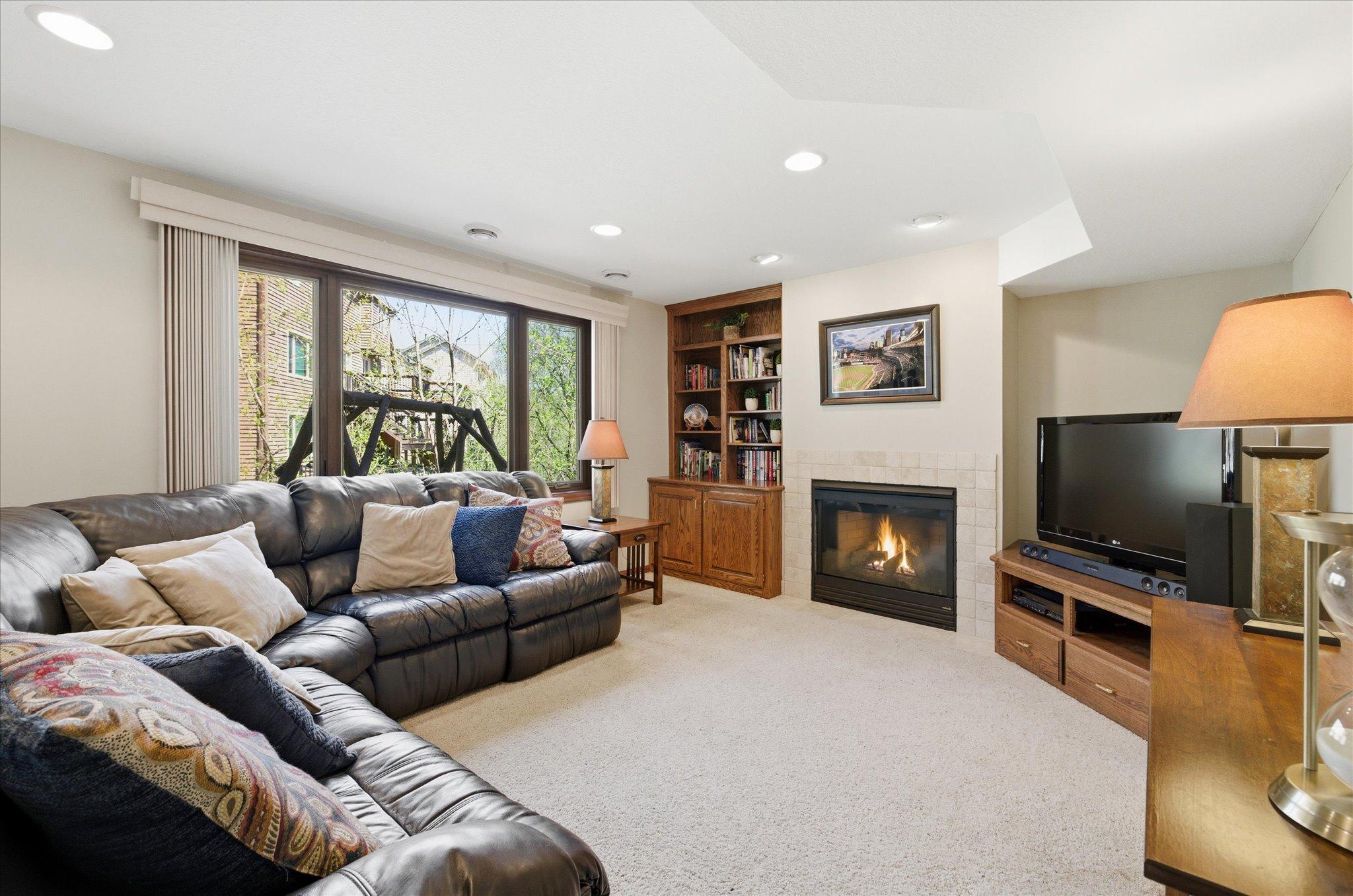 Another great place to hang out. Built in bookshelves, recessed lighting and a gas fireplace.