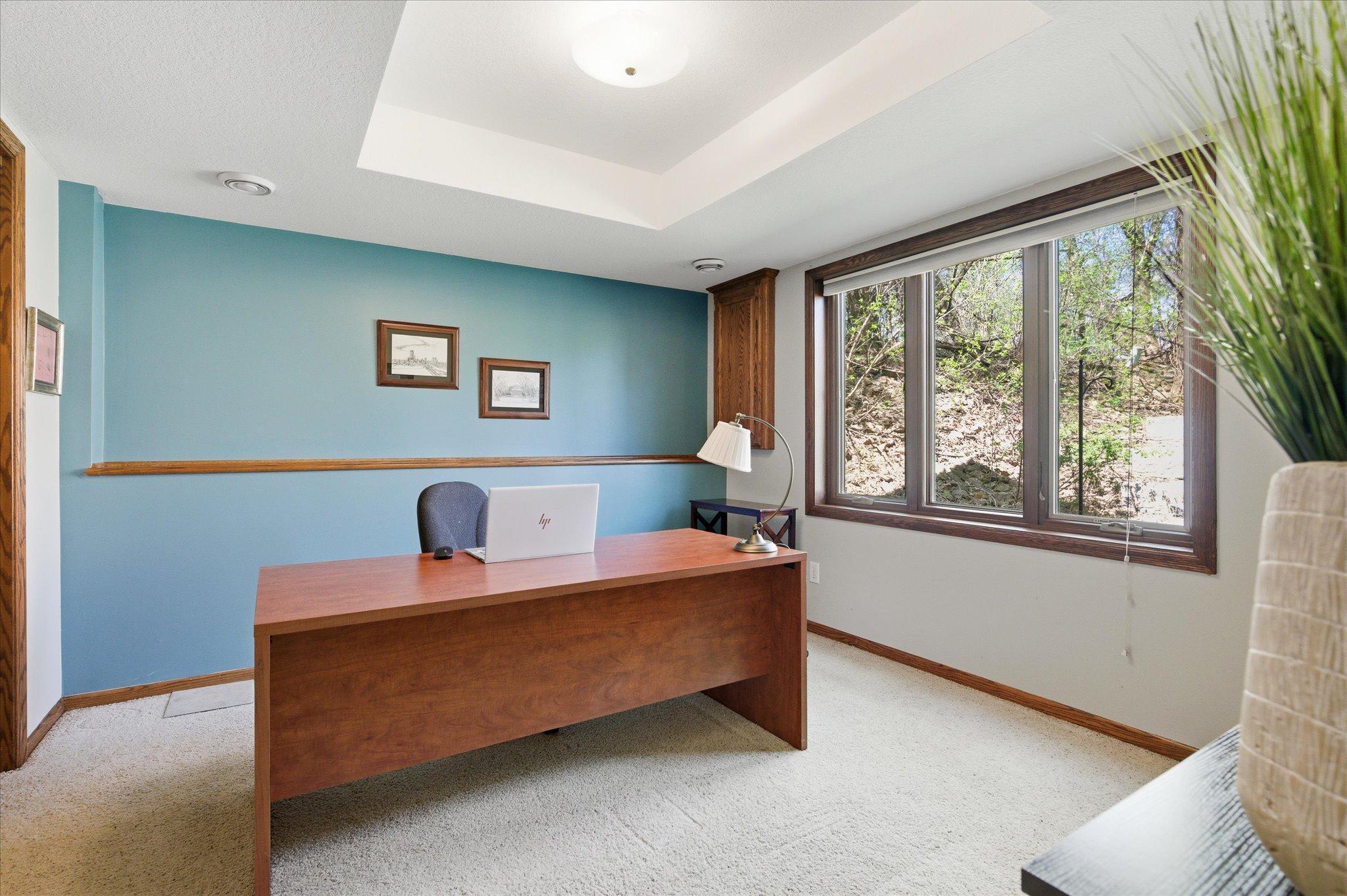 The 5th bedroom is in the lower level and currently being used as an office. Would also make a great playroom, exercise room or craft room.