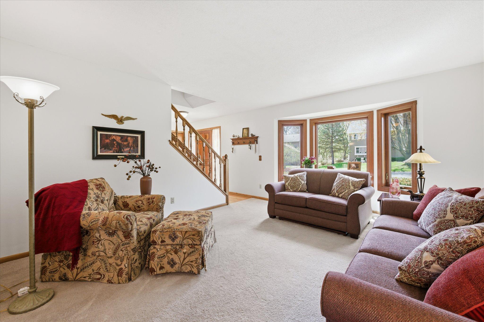 Upon entering the home you are greeted by a big living room that boasts a large newer bay window.