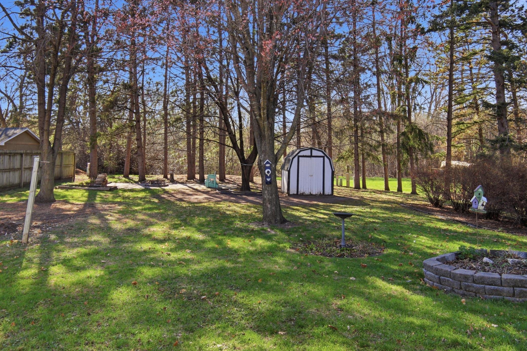 Backyard with storage shed.
