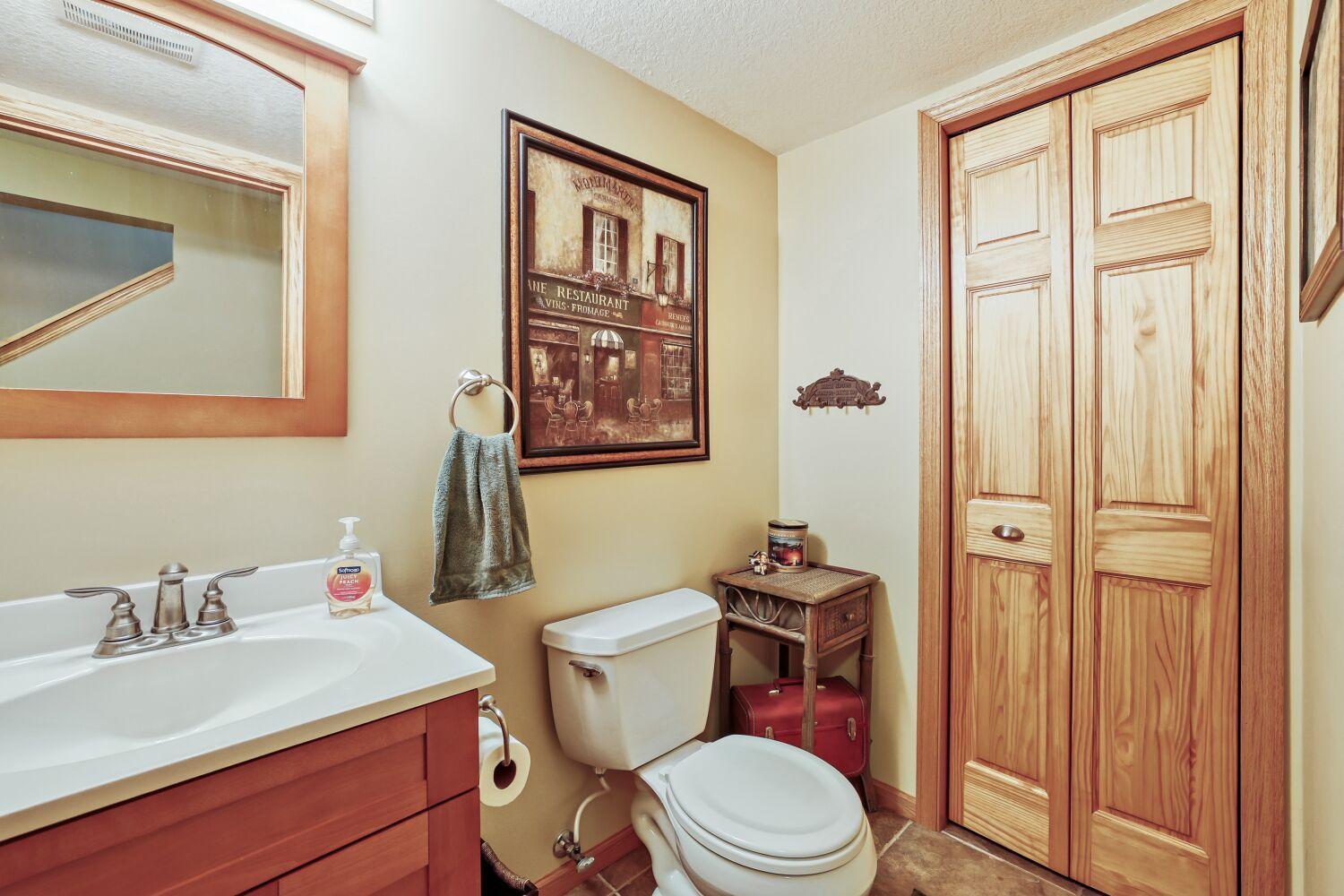 Lower Level 1/2 Bath, plumbed for a shower if buyer would like to add