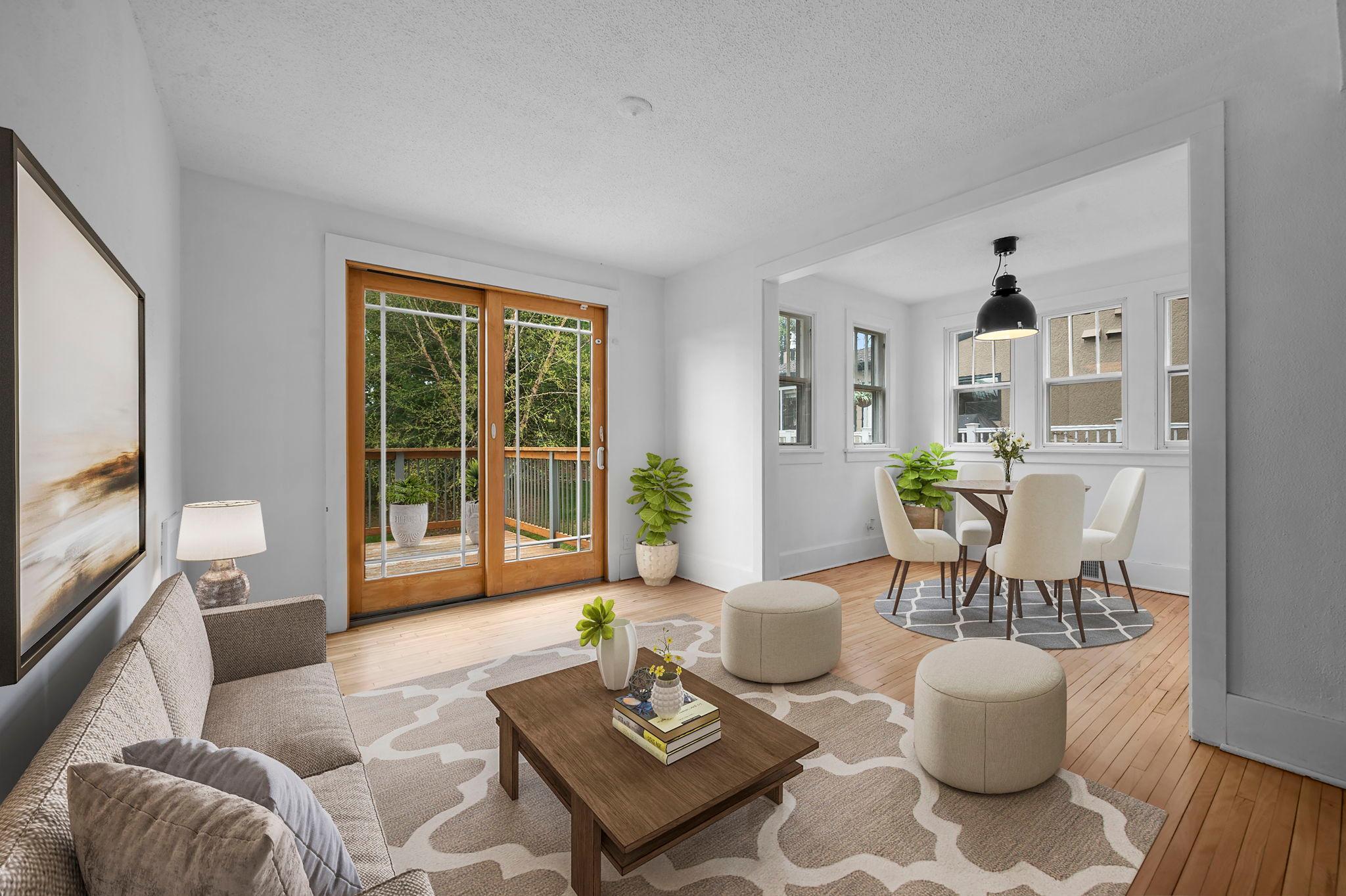 Sliding doors to the deck extend the main living space outdoors, blending indoor comfort with easy outdoor access.