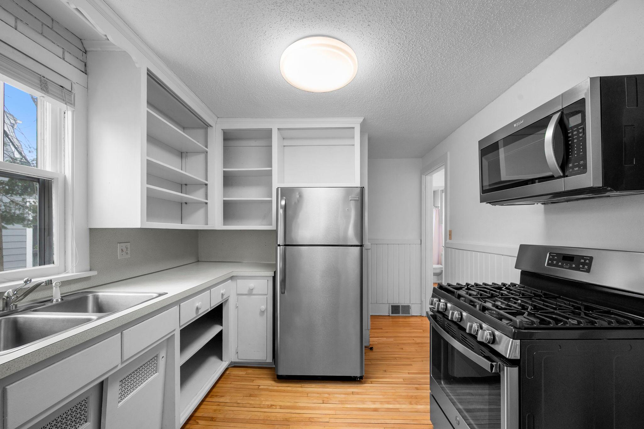 Designed with functionality in mind, the kitchen connects effortlessly to the main living and dining areas for an open, connected feel.