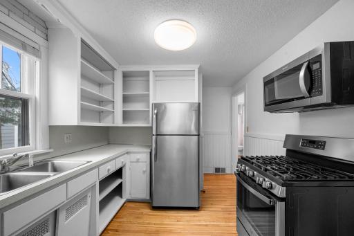 Designed with functionality in mind, the kitchen connects effortlessly to the main living and dining areas for an open, connected feel.