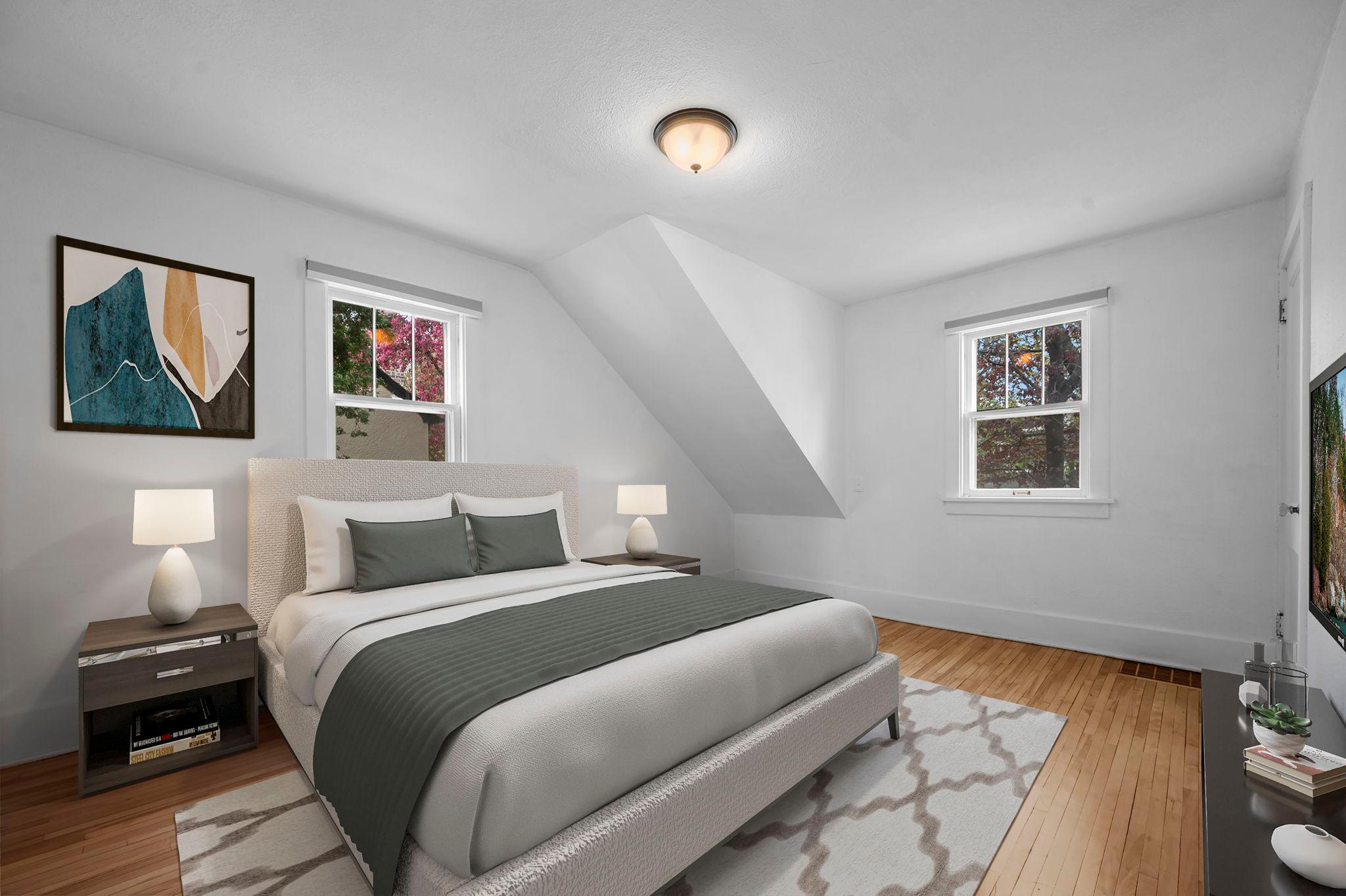 Third upper-level bedroom with large closet space.