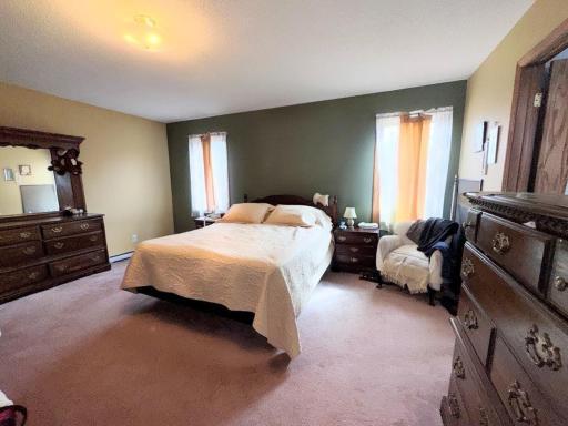 Primary Bedroom has two closets PLUS a walk through bathroom