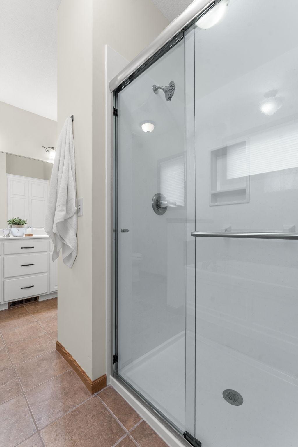The en-suite features a newly installed walk-in shower.