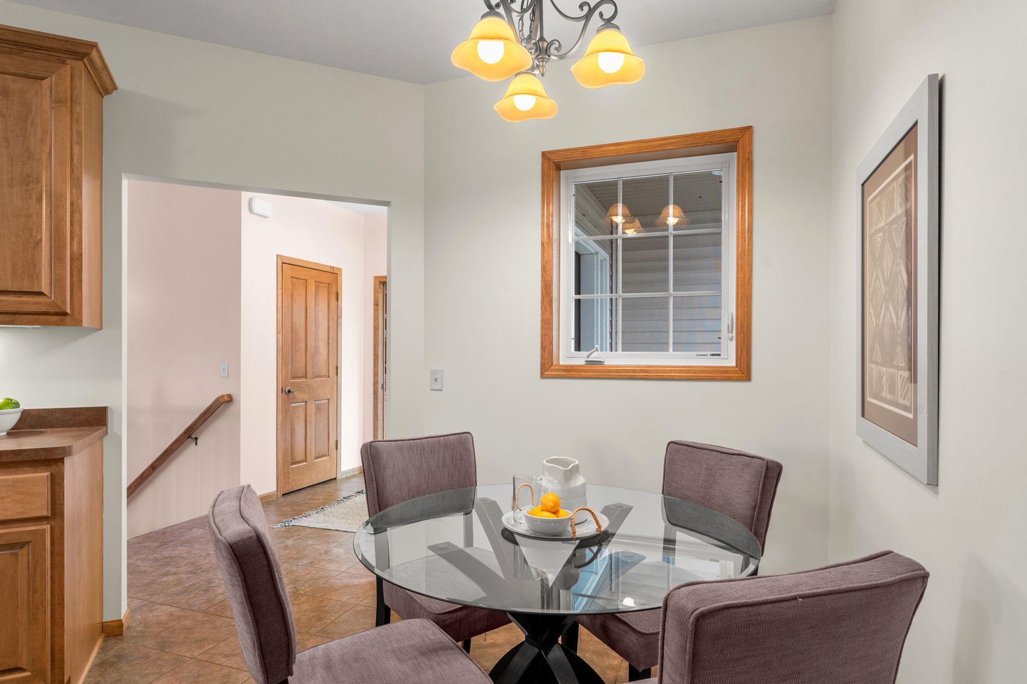 A closer look at the informal dining area, easily accessible from the home’s front entry.